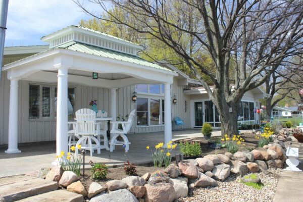 10x12 White Victoria Pavilion Classic Roof beside a house