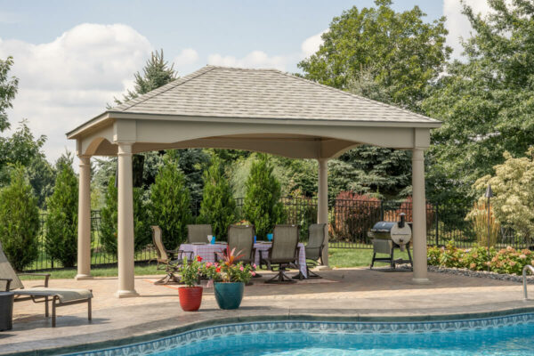 14 x 18 Victoria Pavilion in clay vinyl beside a pool