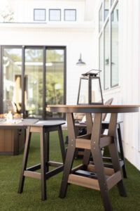 Harbor 38” Round Bar Table in Brazilian Walnut on Black with Saddle Barstool in Black