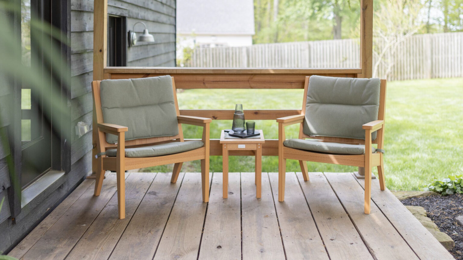 Mayhew Chat Chairs and HDPE End Table in Natural Teak. Cushions in Heritage Leaf