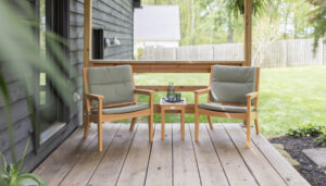 Mayhew Chat Chairs and HDPE End Table in Natural Teak. Cushions in Heritage Leaf