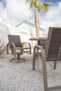 Murphy Poly Swivel Rocker Dining Chairs snd Murphy Dining Height Poly Chairs in Oak Wood Vein with Coastal Gray poly