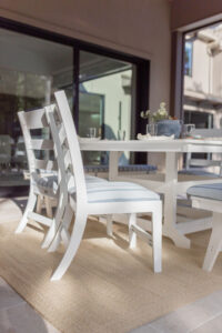 Parker Chairs in Matte White. Cushions in Unwind Sky