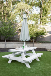 Rectangular Picnic Table in White. Umbrella in Cast Oasis (2)
