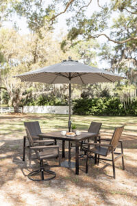 Vida 44 Square Poly Dining Table and Vida Dining Poly Chairs and Dining Swivel Rockers in Brazilian Walnut on Black
