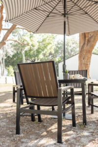 Vida 44 Square Poly Dining Table and Vida Dining Poly Chairs and Dining Swivel Rockers in Brazilian Walnut on Black 5